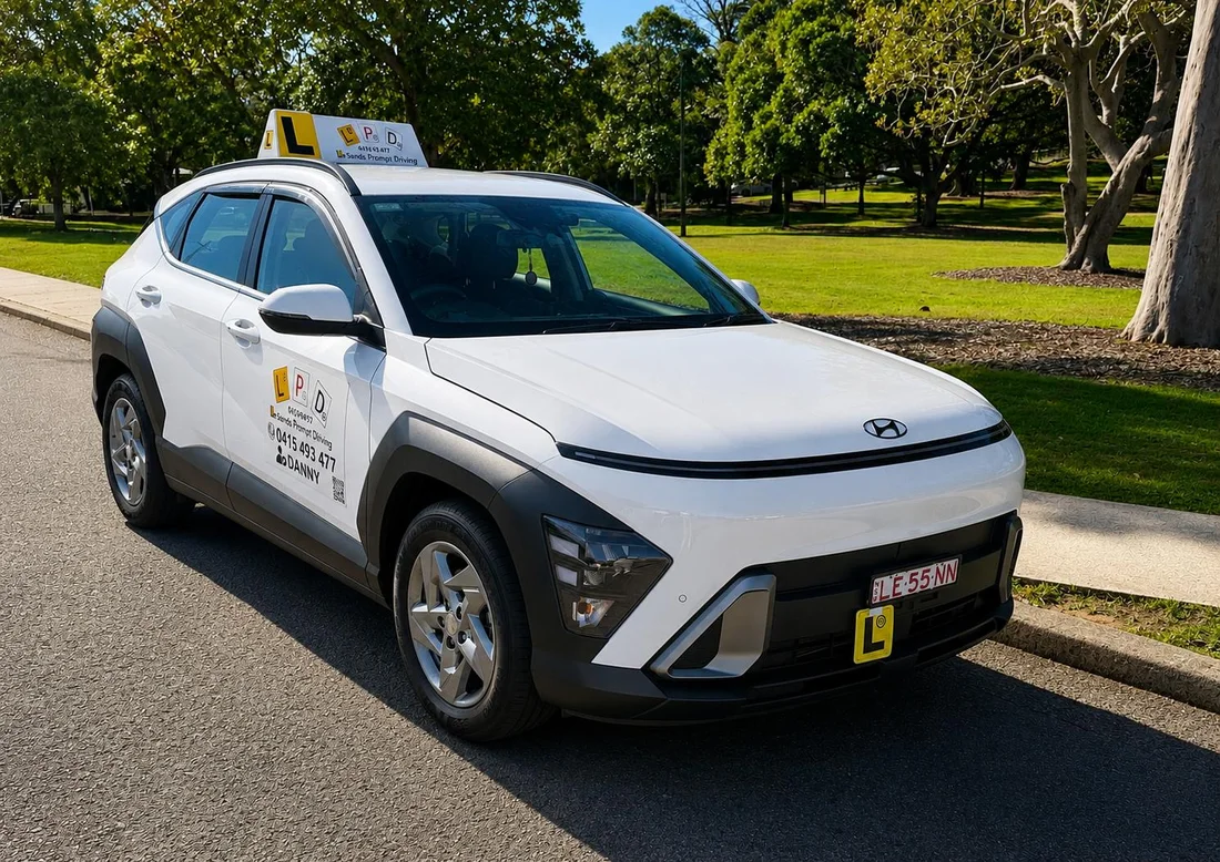 Hyundai Kona driving school car front side view